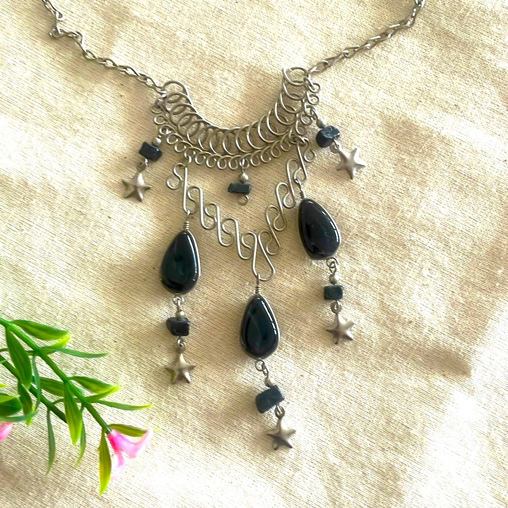 Vintage necklace w/ black stones and stars.
